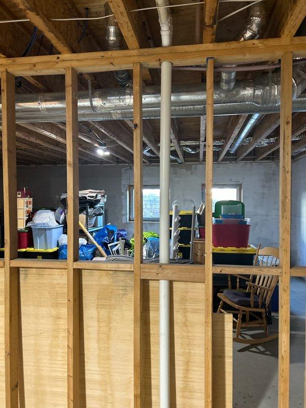 Performed comprehensive geothermal system inspection for property under contract for purchase. System was thoroughly examined including ductwork, water heater components, expansion tank, and associated plumbing infrastructure in basement utility area. All equipment found to be in proper working condition with no issues identified that would require immediate attention or repair.