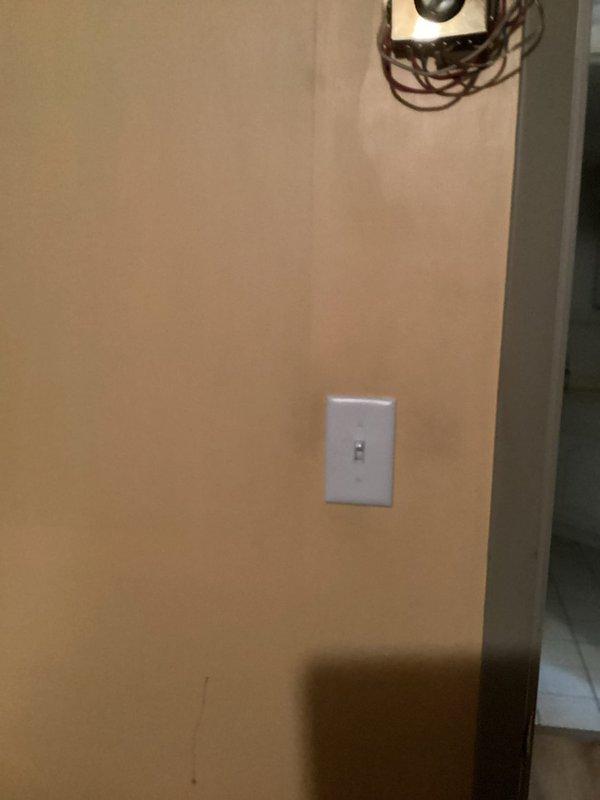 Responded to service call regarding electrical fixture issues. Diagnosed and replaced a faulty switch in the basement that was causing light to flicker, turn on/off intermittently, and produce hissing sounds. Additionally inspected exterior light switch, found it defective, and replaced it while securing loose connections to restore proper functionality.