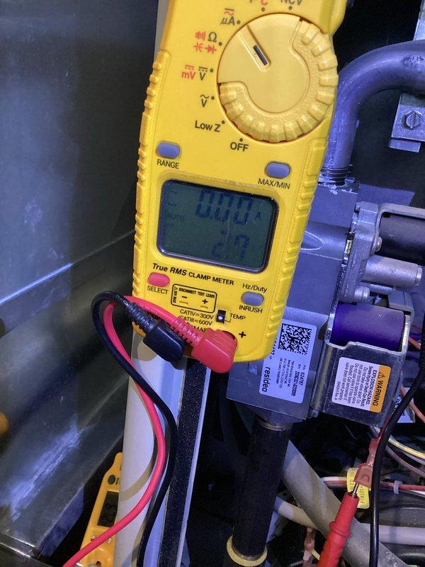 Diagnosed no heat issue on older furnace that was tripping limit switch due to restricted airflow from incorrect filter thickness and malfunctioning humidifier. Performed flame sensor cleaning and filter replacement, restoring proper system operation after verifying electrical readings with multimeter.
