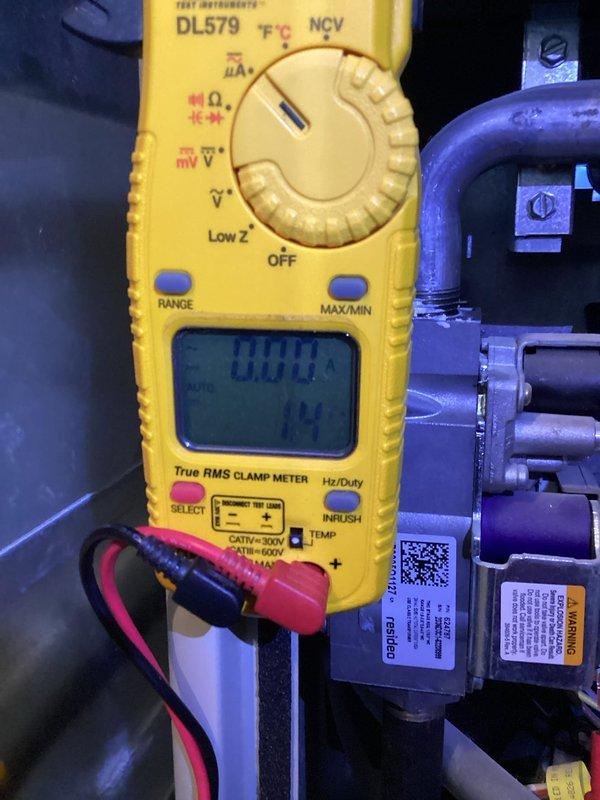 Diagnosed no heat issue on older furnace that was tripping limit switch due to restricted airflow from incorrect filter thickness and malfunctioning humidifier. Performed flame sensor cleaning and filter replacement, restoring proper system operation after verifying electrical readings with multimeter.