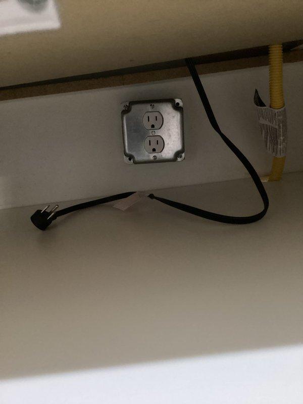 Installed a 120V receptacle under new gas cooktop per estimate, converting a 2-pole 30A circuit to a single-pole 20A circuit. Work completed in 1.5 hours with proper electrical connections to manufacturer specifications.