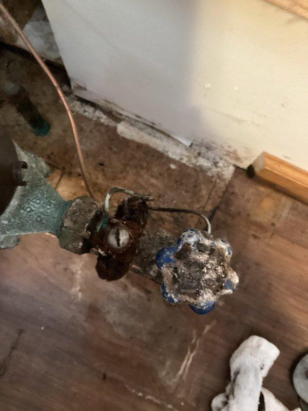 Responded to service call for water main leak after meter. Inspection revealed heavily corroded 3/4" gate valve with significant deterioration and mineral buildup causing active leakage. Coordinated with city water authority to shut off water supply to replace the damaged flared meter stop.