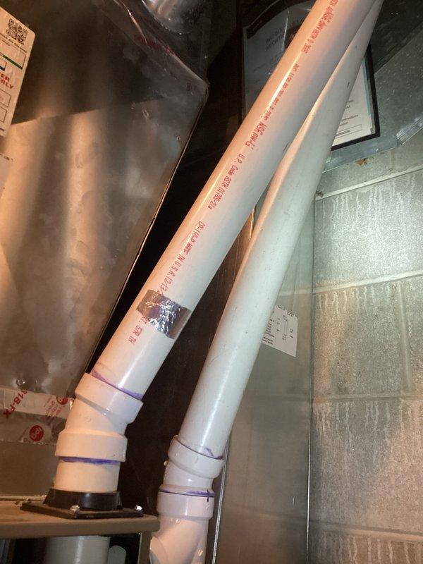 Performed scheduled preventative maintenance on HVAC system per agreement. Cleaned components and inspected drainage system. Identified and repaired condensate trap leak in PVC drain line with metallic tape, ensuring proper system drainage functionality.