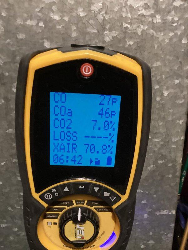 Performed scheduled preventative maintenance agreement service within 8-12 arrival window. Conducted comprehensive system tune-up including combustion analysis testing (measured CO2 at 7.0%, excess air at 70.8%). Inspected condensate drainage system and verified proper operation of all components. System operating within normal parameters after service.