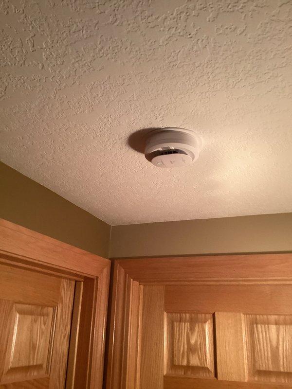 Responded to service call to replace four expired smoke/CO2 alarms that had reached their 10-year service life. Successfully installed new ceiling-mounted detectors throughout the residence and verified proper operation. Inspected main electrical panel during visit to ensure all connections were secure and functioning correctly.