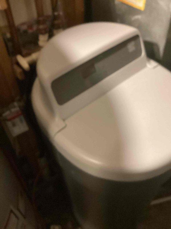 Arrived at scheduled appointment window to provide estimate for installation of customer-supplied water softener system. Customer was not home until 3:30pm. Conducted assessment of existing plumbing infrastructure and water supply system to determine installation requirements for the customer's water treatment equipment. Documented current setup with photographs for reference during quote preparation.