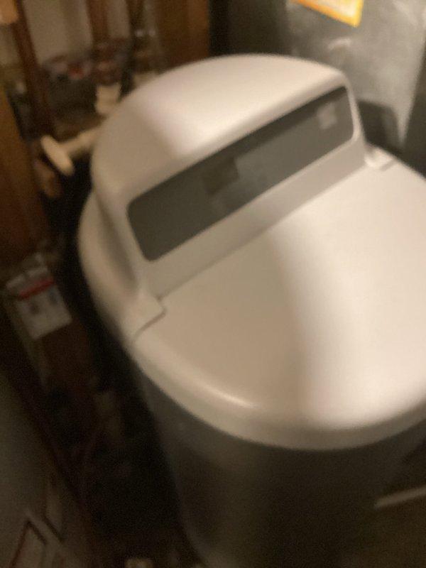 Arrived at scheduled appointment window to provide estimate for installation of customer-supplied water softener system. Customer was not home until 3:30pm. Conducted assessment of existing plumbing infrastructure and water supply system to determine installation requirements for the customer's water treatment equipment. Documented current setup with photographs for reference during quote preparation.