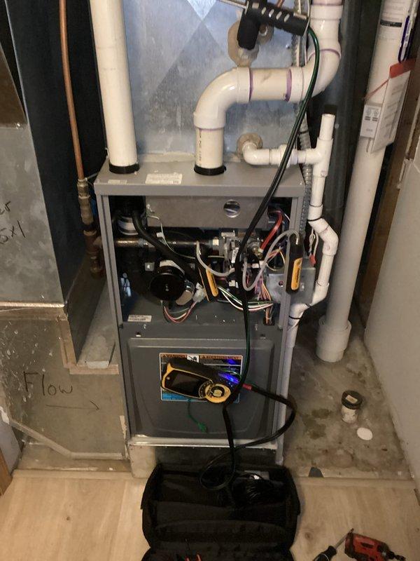 Performed scheduled maintenance tune-up on residential HVAC system. Inspected furnace components including electrical connections, PVC venting system, and condensate drain line. Unit is functioning properly with no issues identified.