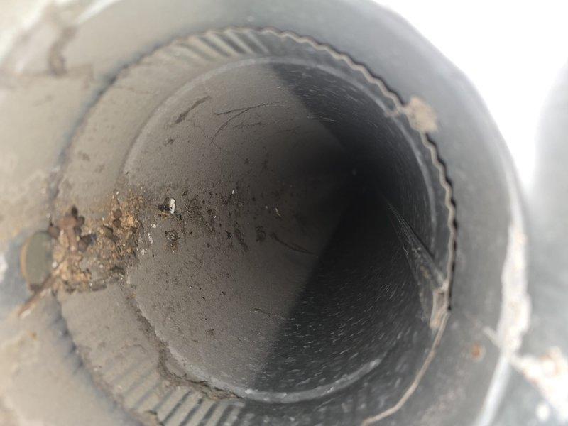 Performed comprehensive duct cleaning service to address accumulated dust and debris in HVAC system. Inspection revealed significant buildup along interior duct surfaces, with visible brownish deposits and particulate matter in both main and branch ducts. Thoroughly cleaned all accessible vents and ductwork, restoring proper airflow and removing potential air quality contaminants.