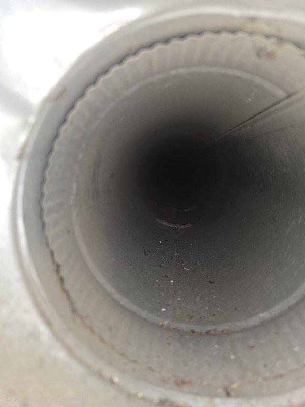 Performed comprehensive duct cleaning service to address accumulated dust and debris in HVAC system. Inspection revealed significant buildup along interior duct surfaces, with visible brownish deposits and particulate matter in both main and branch ducts. Thoroughly cleaned all accessible vents and ductwork, restoring proper airflow and removing potential air quality contaminants.