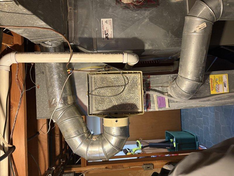 Responded to service call for Aprilaire humidifier leaking issue. Upon inspection, discovered humidifier pad was incorrectly installed by previous technician. Properly repositioned the evaporator pad in the humidifier unit and verified proper operation with no further leakage.