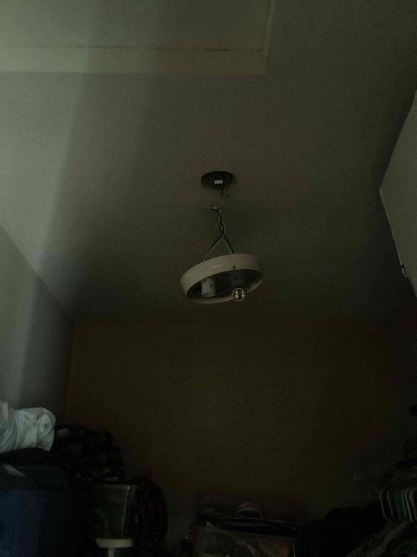 Responded to service call for non-functional closet light. Upon inspection, found damaged fixture with hanging porcelain sockets and non-working bulbs. Replaced complete fixture, restoring proper illumination to the space.