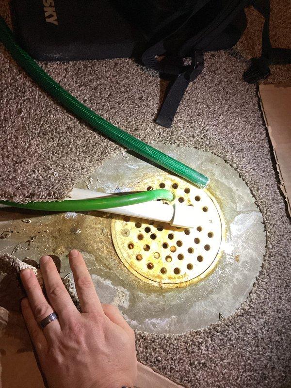 Responded to urgent call for water leakage from furnace. Relocated humidifier drain line to floor drain and secured with zip ties to prevent further leakage. Replaced batteries in outdoor temperature sensor and installed new furnace filter to restore proper system functionality.