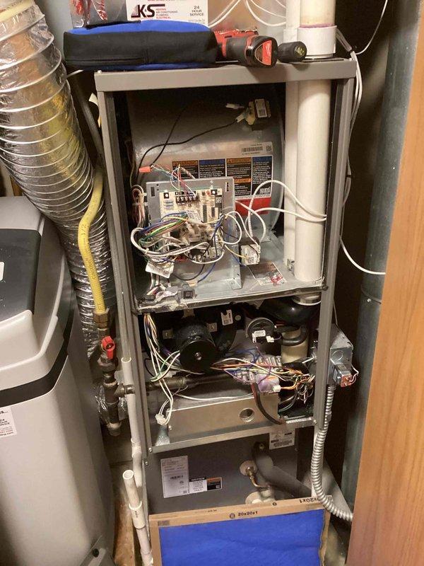Performed comprehensive furnace tune-up service including inspection of internal components, electrical connections, and control board functionality. Identified worn water panel requiring replacement and installed new one to ensure proper humidification. Provided customer with Family Rewards program information per request.