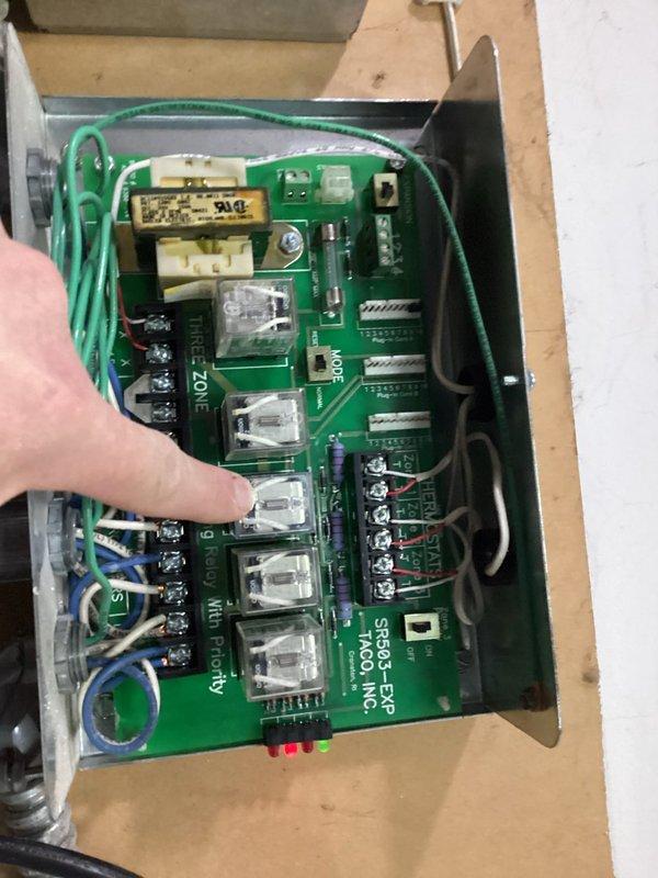 Arrived on site to install power relay on TACO SR863 EXP zone control board. Successfully identified faulty relay component on circuit board and replaced with customer-provided replacement part, restoring proper system functionality.