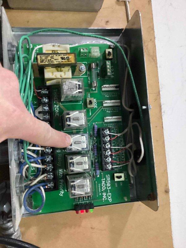 Arrived on site to install power relay on TACO SR863 EXP zone control board. Successfully identified faulty relay component on circuit board and replaced with customer-provided replacement part, restoring proper system functionality.