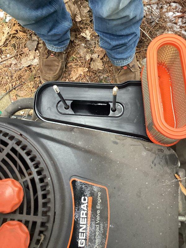 Performed scheduled maintenance on two Generac generators. Inspected and serviced the air filter assembly, which showed normal wear. Both generators were operational with no issues identified.