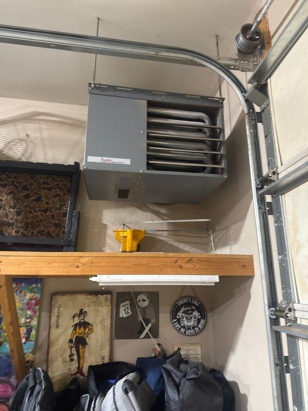 Responded to no-heat call for garage ceiling-mounted heating unit. Diagnostic testing with UEi CT61 combustion analyzer identified failing control board as the source of ignition failure. Provided customer with estimate for replacement control board.