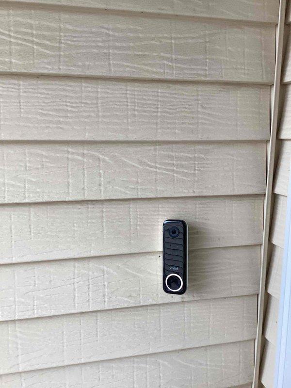 Diagnosed non-functioning smart doorbell system and identified missing wire connection. Accessed electrical panel to trace wiring pathway, then successfully reconnected necessary wires to restore power to the device. Video doorbell now receiving proper voltage and functioning as intended.
