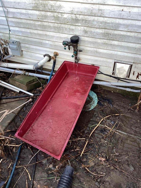 Responded to emergency service call for severely leaking outdoor spigot requiring main water shutoff. Upon inspection, discovered a 10-year-old unused faucet with seal failure due to freeze-thaw damage. Per customer request, cut the supply line and installed a ball valve for future connection point, effectively resolving the leak.