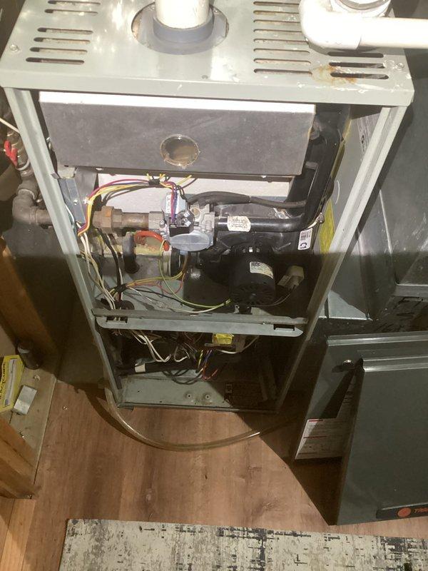 Responded to callback for furnace failure after previous service on 2/17. Upon inspection, identified clogged condensate trap as the root cause of system shutdown. Successfully cleared the obstruction in the trap, restoring proper condensate drainage and returning the furnace to normal operation.