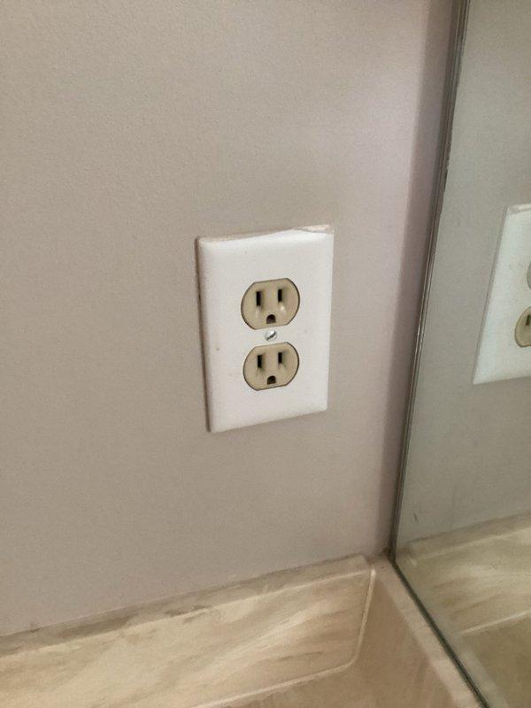Responded to service request for non-functional outlets and switch. Diagnosed and replaced faulty GFCI receptacle in basement bathroom and installed new light switch in kitchen to restore proper electrical function. All repairs were completed successfully with verification of proper operation.