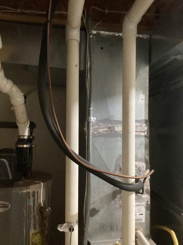 Completed scheduled maintenance on air handler unit. Diagnosed and replaced control board showing burn marks. Cleaned blower wheel to restore proper operation. Documented condition of HVAC system with photos showing installation configuration and component condition.