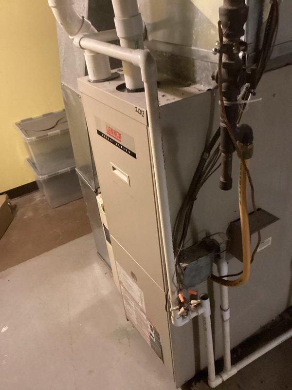 Responded to no-heat service call for 2003 Lennox furnace. Diagnosed failed inducer fan motor in air handler. System was shut down and customer advised of replacement options for either the inducer assembly or complete furnace replacement due to unit age.