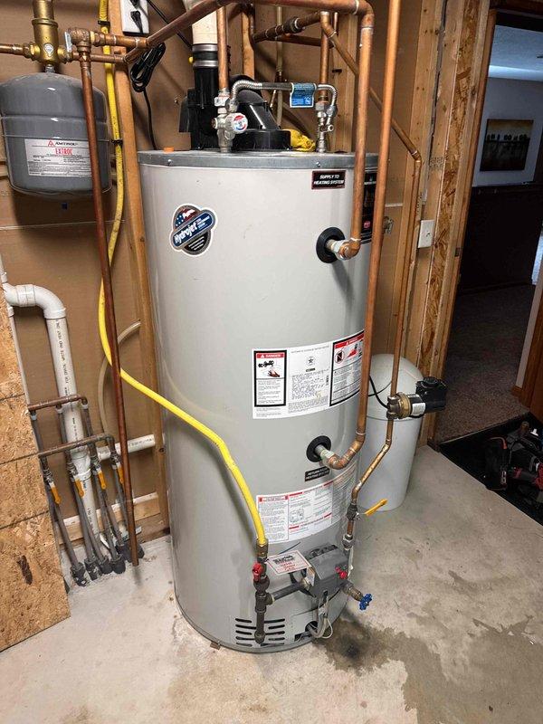 Responded to service call for Bradford White water heater experiencing sediment issues. Replaced deteriorated anode rod which was the source of sediment contamination. Thoroughly flushed system until water ran clear, restoring proper operation of the unit.