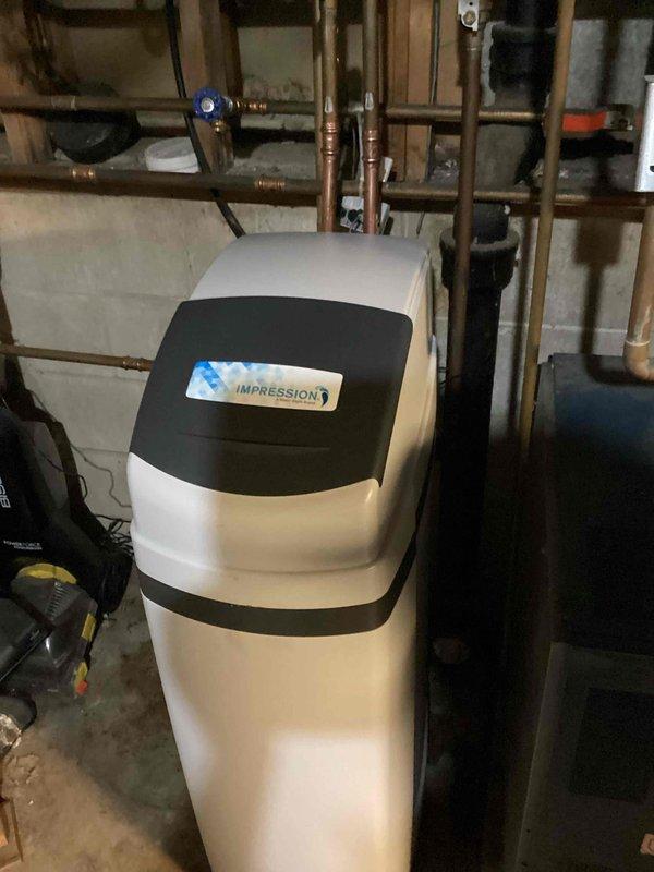 Arrived within scheduled 12-4 window and successfully removed existing water softener system, installing new Impression brand water softener in its place. Completed all necessary copper pipe connections to integrate the unit with the existing water supply infrastructure, and verified proper system operation after installation.