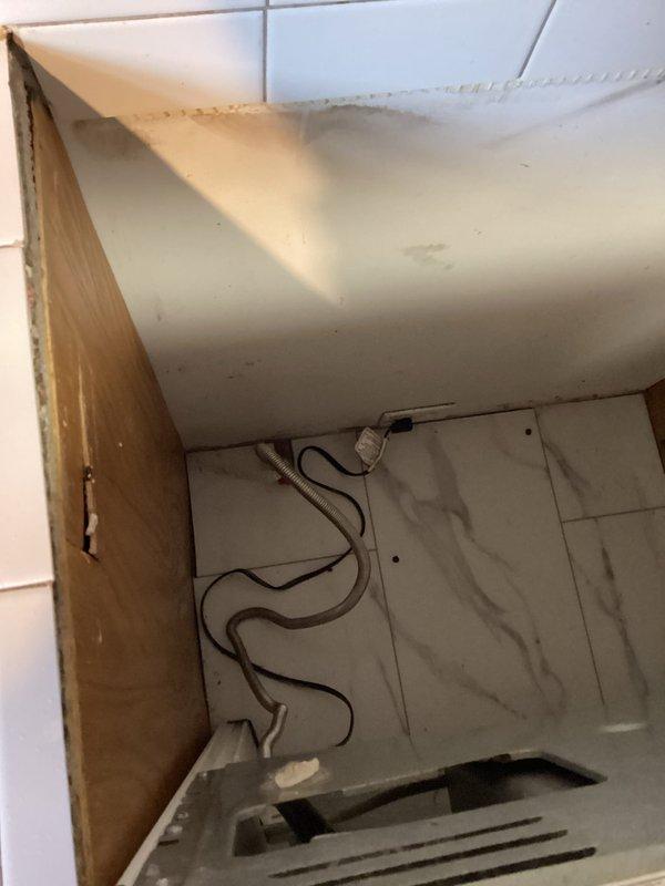 Arrived within scheduled window to disconnect old gas range and install new gas appliance. Successfully installed new gas line, connected to customer's range, and verified proper operation by testing all burners. Documented installation with photos showing completed hookup and operational burners with proper flame pattern.