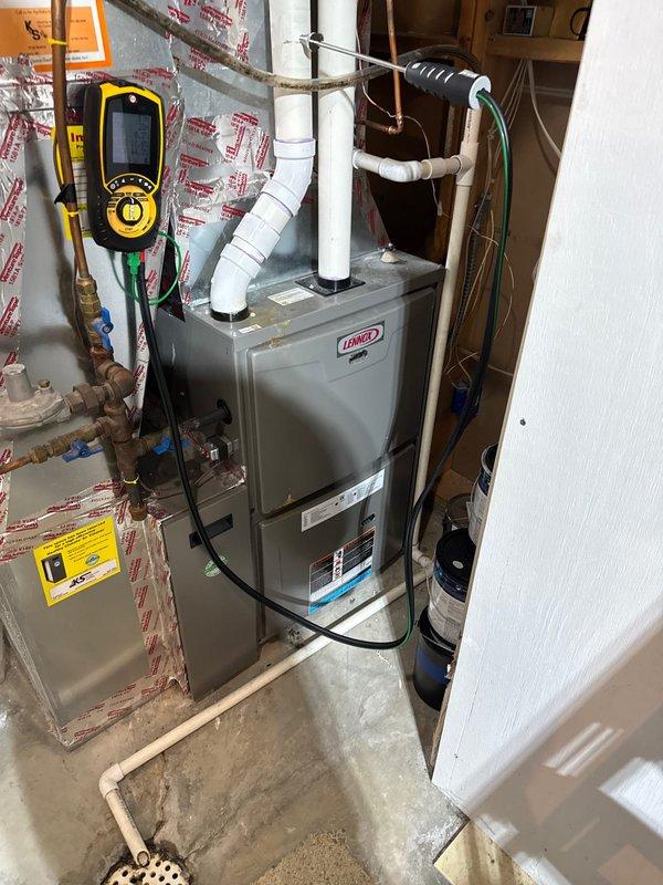 Performed scheduled preventative maintenance agreement service on Lennox furnace system. Conducted combustion analysis using digital analyzer, which showed CO2 levels, temperature readings (38°F), combustion efficiency loss (11.1%), and excess air (43.4%). Inspected all system components and connections, confirming proper operation of the heating system.