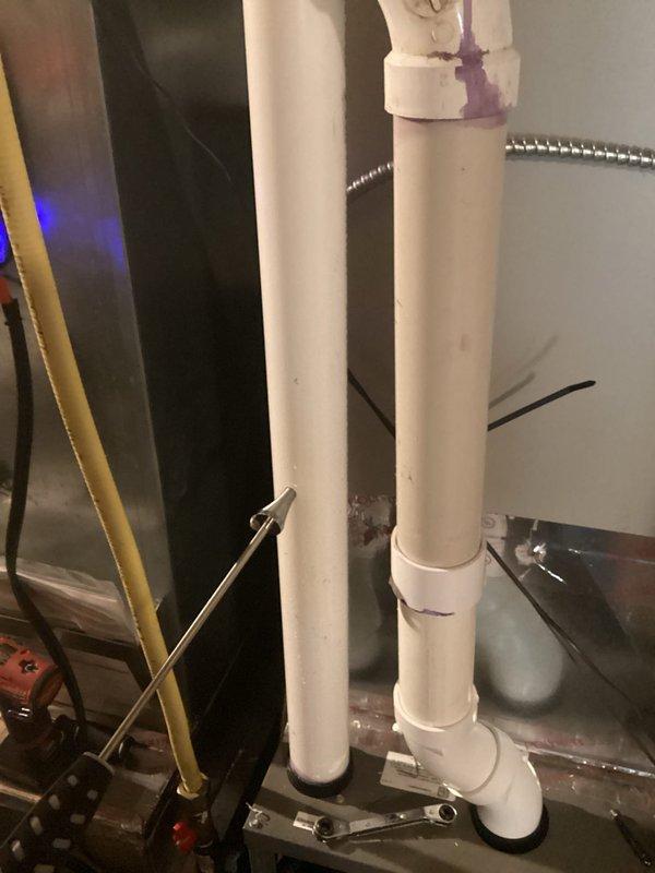 Performed annual preventative maintenance on air handler system. Inspected ductwork, air exchanger components, and associated plumbing connections. Noted previous service issue regarding missing switches for air exchanger; documentation indicates customer never responded to follow-up. All connections properly sealed with PVC primer at joints. System tuned and left in proper working condition.