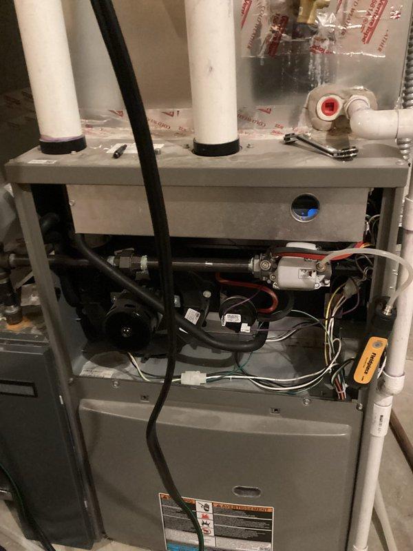 Performed scheduled preventative maintenance agreement service on heating system. Conducted comprehensive diagnostic testing with temperature readings (38°F/54°F) and verified proper system operation. Completed standard tune-up procedures on furnace with PVC venting system; all components functioning within normal parameters.