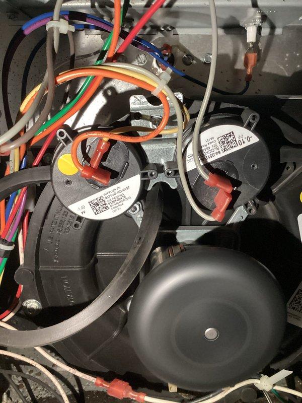 Diagnosed inoperative furnace with no heat issue. Inspection revealed water accumulation in pressure switch tubing, preventing proper system operation. Replaced faulty pressure switch and installed rain gutter to prevent future water intrusion, successfully restoring heat functionality.