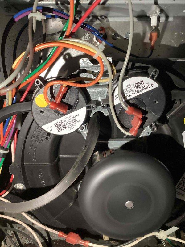 Diagnosed inoperative furnace with no heat issue. Inspection revealed water accumulation in pressure switch tubing, preventing proper system operation. Replaced faulty pressure switch and installed rain gutter to prevent future water intrusion, successfully restoring heat functionality.