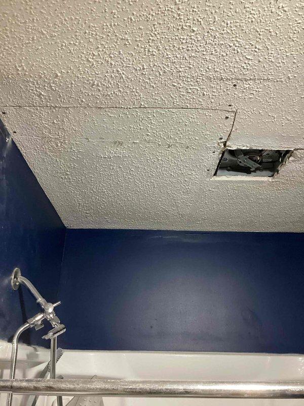 Responded to service call for bathroom exhaust fan repeatedly tripping circuit breaker during customer's installation attempt. Diagnostic inspection revealed pinched and broken wiring in ceiling cavity. Repaired issue by replacing damaged section with new wire and installed proper switch leg connection to restore safe operation of the bathroom fan.