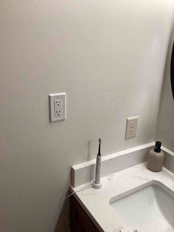 Performed a formal rental property electrical inspection with focus on code-compliant protection systems. Verified all outlets and breakers requiring Arc Fault or ground fault protection meet current electrical code requirements. Documented fireplace operation and GFCI outlet installation in bathroom with photographic evidence.