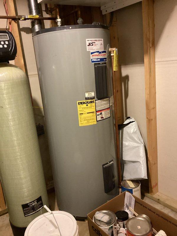 Conducted a comprehensive plumbing inspection of residential property with arrival between 8-12. Examined water treatment system (water softener, filtration tank), water heater, and associated plumbing connections throughout utility room. All systems were found to be in excellent working condition with no issues requiring repair or maintenance.