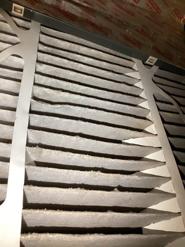 Diagnosed no heat issue where thermostat couldn't exceed 62°F and was delivering cold air. Inspection revealed a faulty dual pressure switch which was replaced to restore proper system operation. Also noted significant dust accumulation on air filter requiring immediate attention to prevent airflow restriction and potential system damage.