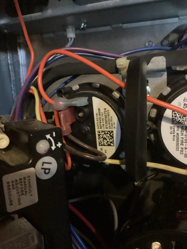 Diagnosed no heat issue where thermostat couldn't exceed 62°F and was delivering cold air. Inspection revealed a faulty dual pressure switch which was replaced to restore proper system operation. Also noted significant dust accumulation on air filter requiring immediate attention to prevent airflow restriction and potential system damage.