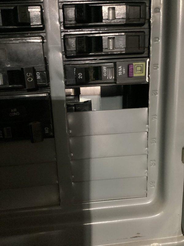 Responded to service call for tripping duplex breakers in garage. Diagnosed issue with freezer causing breaker to trip. Determined breaker was faulty and installed new Square D replacement breaker to resolve the problem.