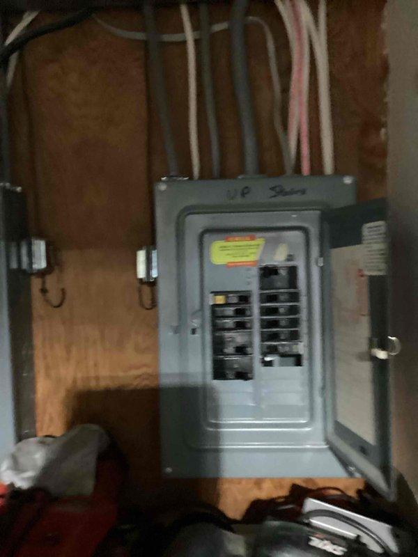 Responded to service call for tripping duplex breakers in garage. Diagnosed issue with freezer causing breaker to trip. Determined breaker was faulty and installed new Square D replacement breaker to resolve the problem.