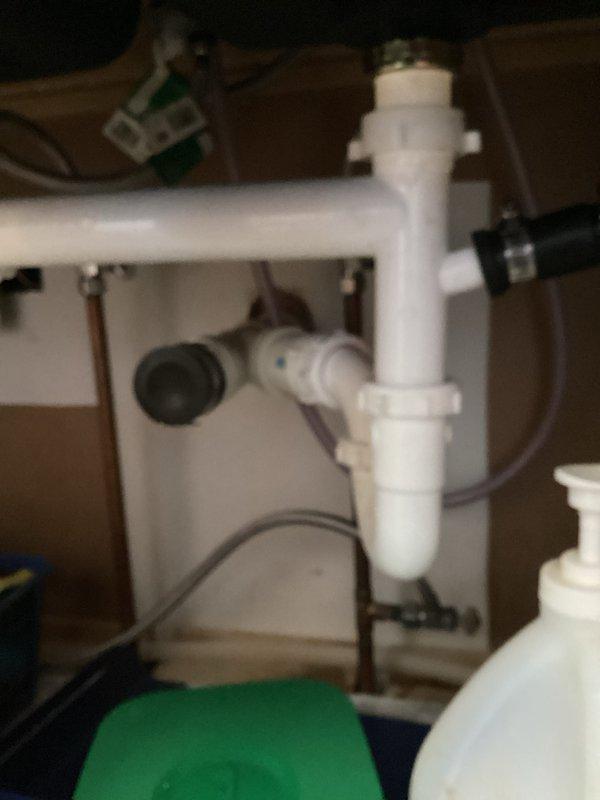 Arrived to address reported leak under kitchen sink. Diagnosed issue as a leaking basket strainer at the nut connection. Successfully repaired by installing new nut on the basket strainer assembly, resolving the leak.