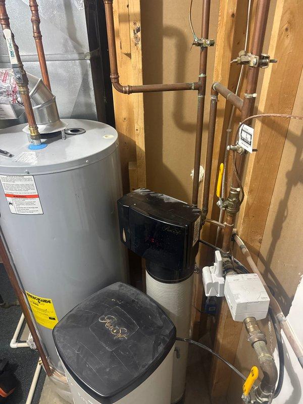 Upon arrival, diagnosed RainSoft Gold series water softener displaying 1b error code, indicating a seized piston. After thorough inspection of the system components and control panel, determined the unit requires complete replacement. Provided customer with estimate for new system installation.