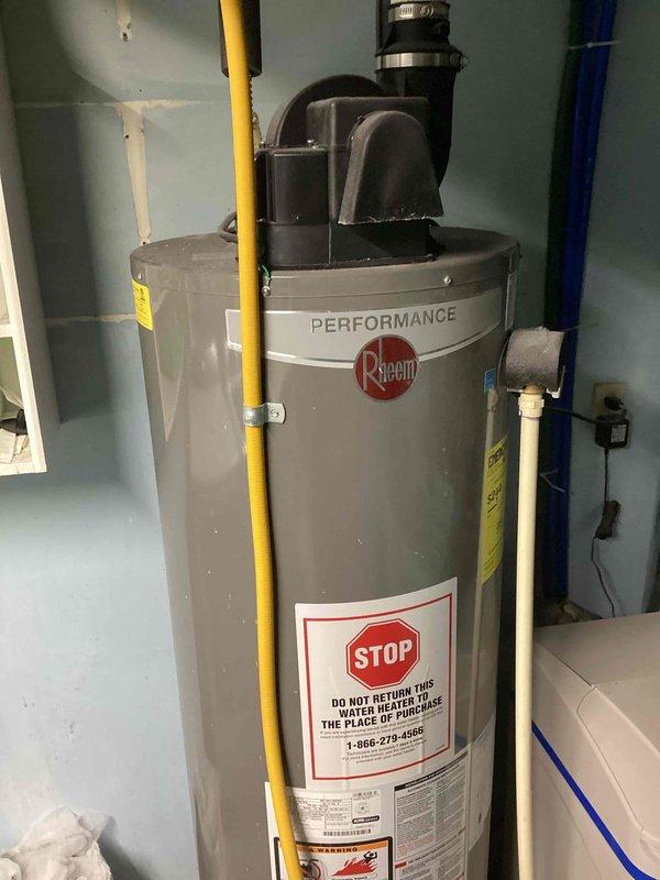 Diagnosed and repaired an 11-year-old Rheem Performance water heater that was slowly losing hot water capacity. Found heat sensor wire disconnected from terminal which prevented proper temperature regulation, and reattached it to restore normal operation. Advised customer about likely sediment buildup in tank contributing to reduced heating efficiency and recommended tank flushing to improve performance.