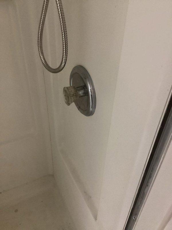 Replaced defective Moen 1222 cartridge in laundry room shower valve that was preventing proper water shutoff. Removed old cartridge, installed new replacement, and verified proper operation after restoring water supply to the home.