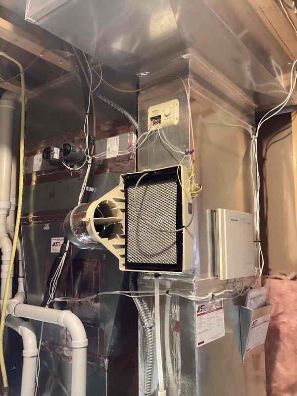 Replaced undersized damper that was restricting airflow to the HVAC system in basement mechanical room. Installed new correctly-sized damper to restore proper air distribution throughout the ductwork network. System now operating at optimal efficiency with improved airflow.