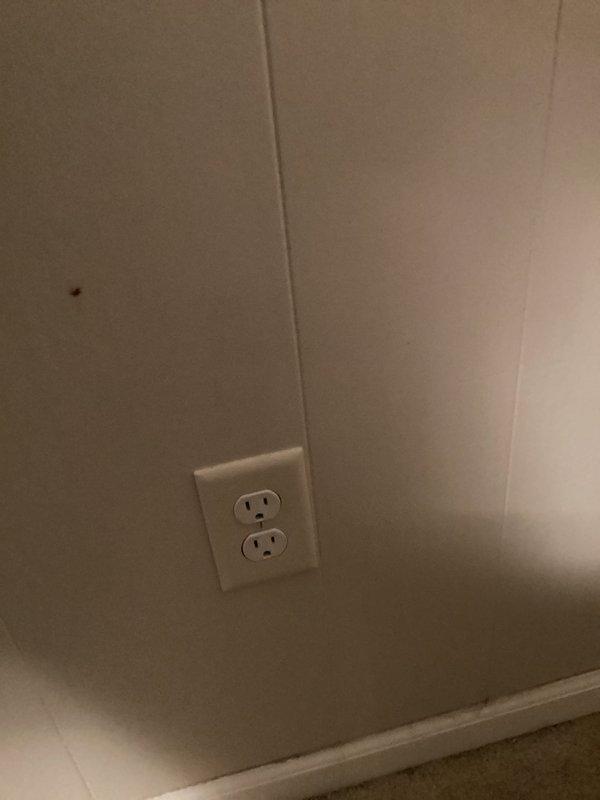 Diagnosed and repaired a faulty GFCI outlet that was incorrectly wired, which had caused power loss to two outlets and a bathroom light socket. Properly rewired the GFCI, restoring electrical function to all affected fixtures in the downstairs bedroom and connected bathroom.