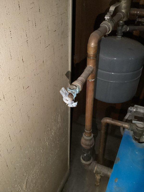 Responded to service call for a leaking boiler. Upon inspection, identified leakage from boiler drains. Replaced boiler drain on supply side and capped drain at base of boiler to resolve the issue.